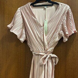 Never Worn with tag Rose She and Sky fun party dress in a size medium